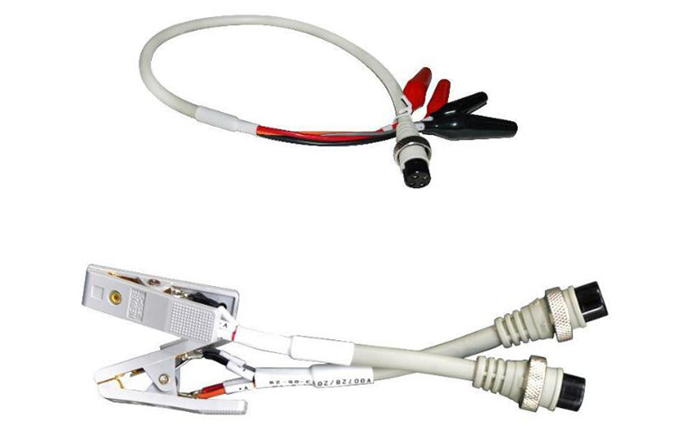 Coin cell clamps for battery tester